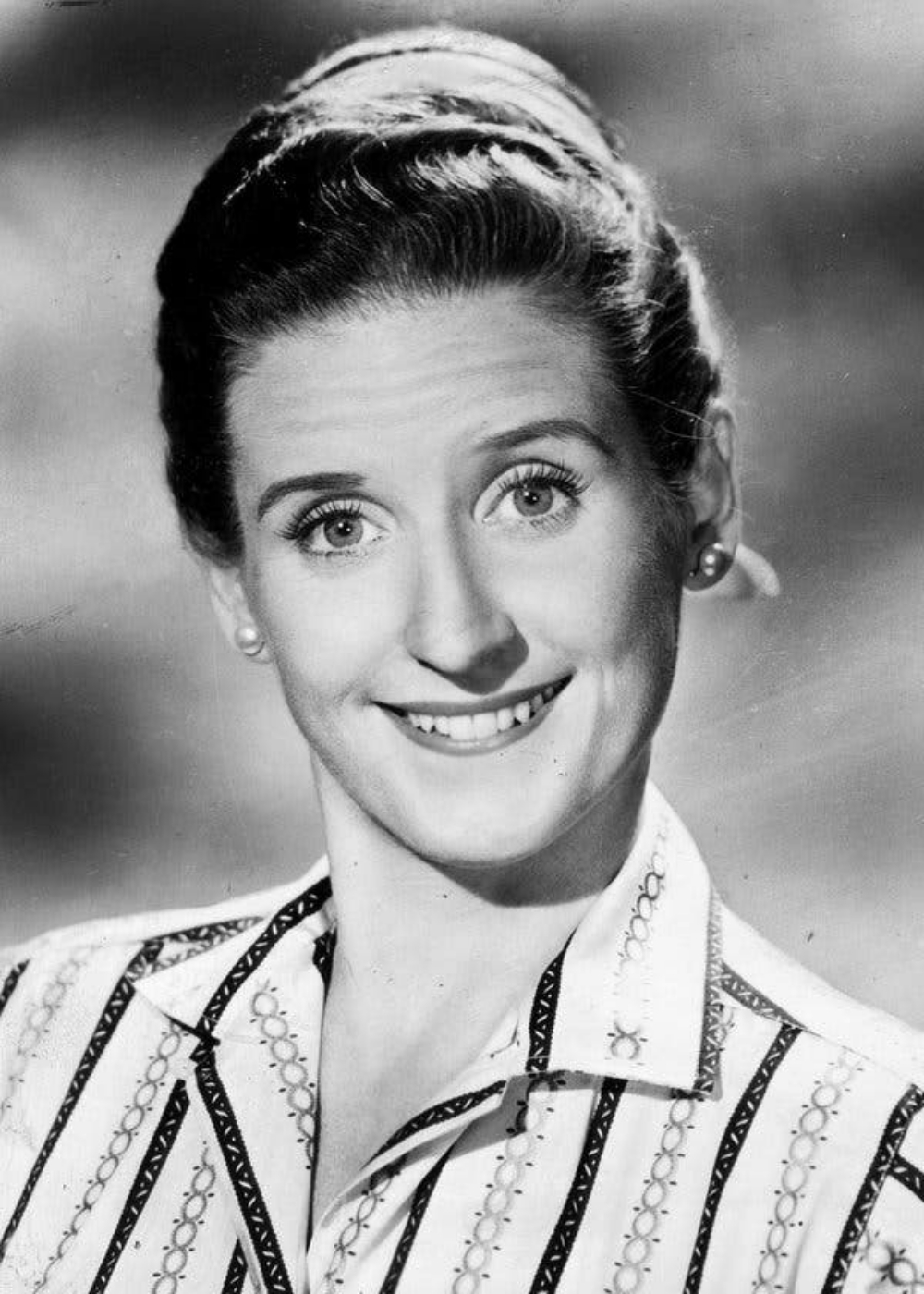 Ann Davic headshot as a young comedian