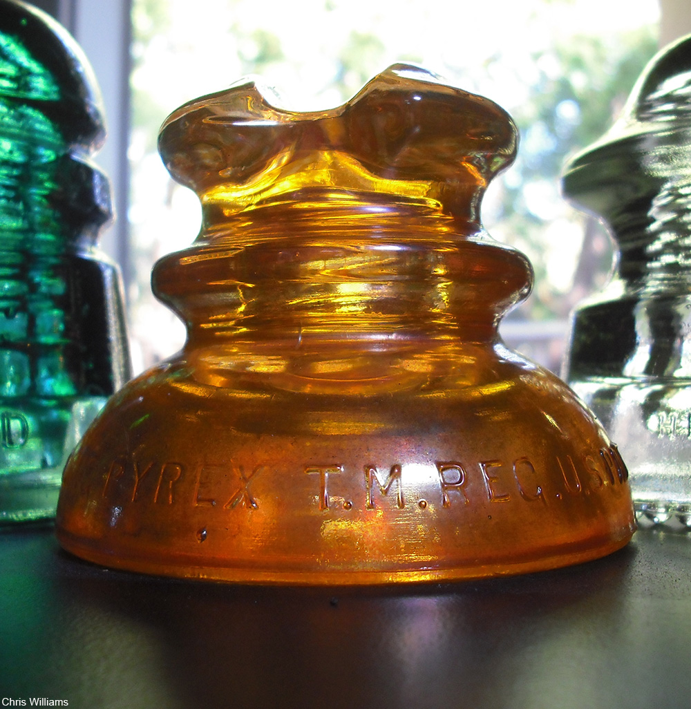 The Hidden Beauty of Collecting Glass Telephone Insulators Dusty Old Thing