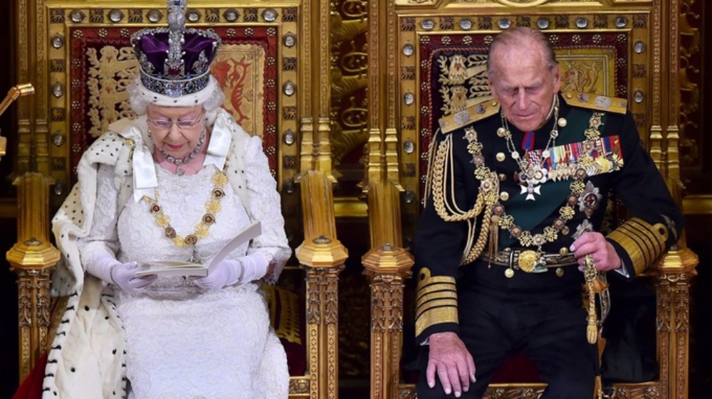 Queen Elizabeth II And Prince Philip sitting on thrones