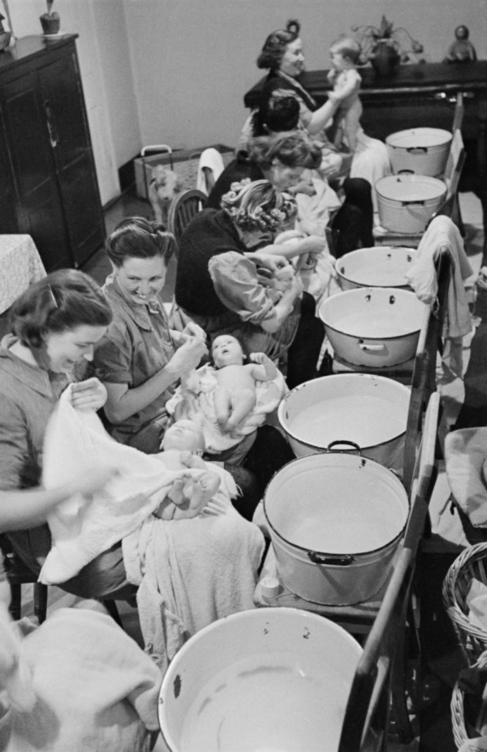 Prisoner mothers bathe their babies in a hospital ward at Holloway Prison in London, 1947.