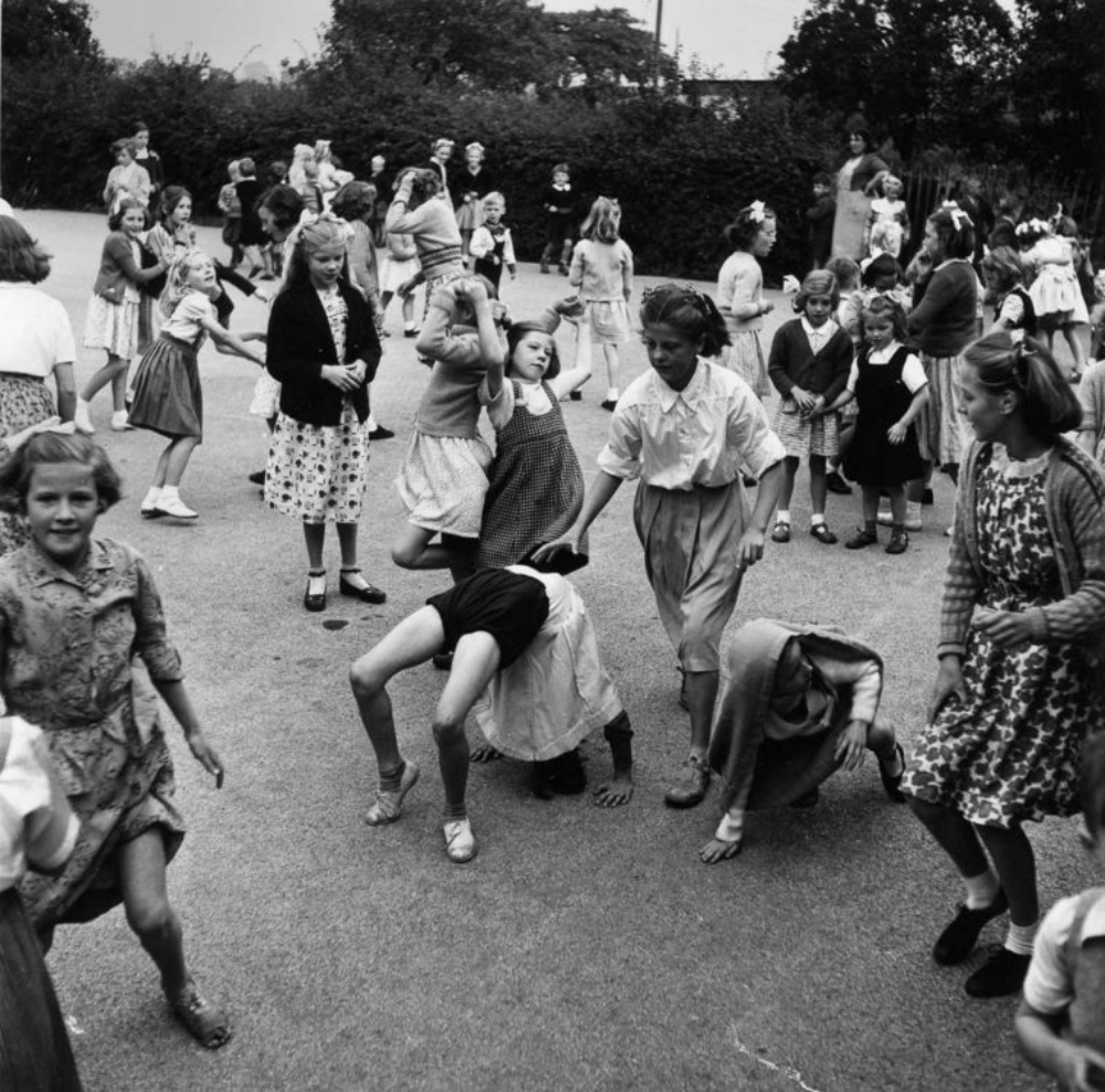 A crowd of schoolchildren in the playground of Walsgrave Colliery School near Coventry, England, 1952.