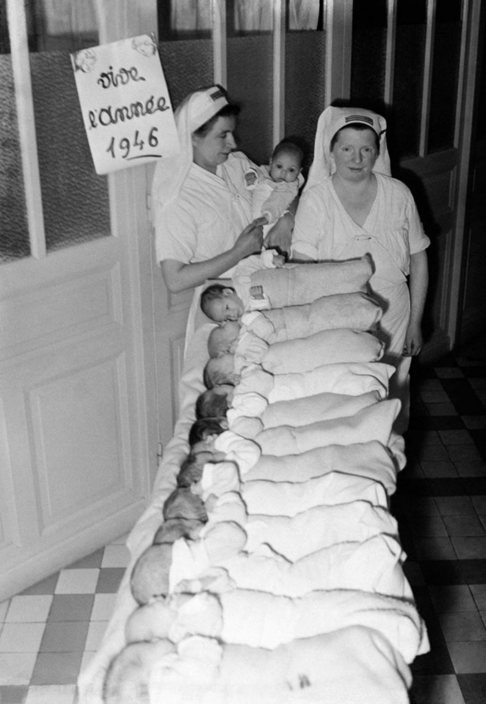The first babies of the new year in a maternity ward in Paris, 1946.