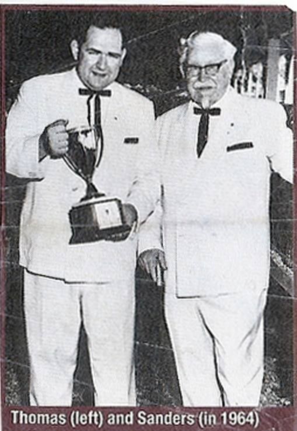 black and white photo of Dave Thomas and Colonel Sanders