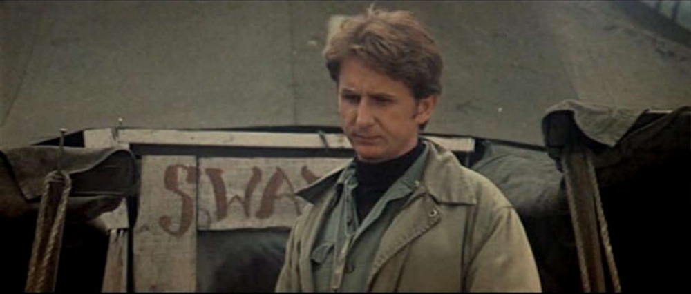 René Auberjonois as Father John Mulcahy in the MASH movie