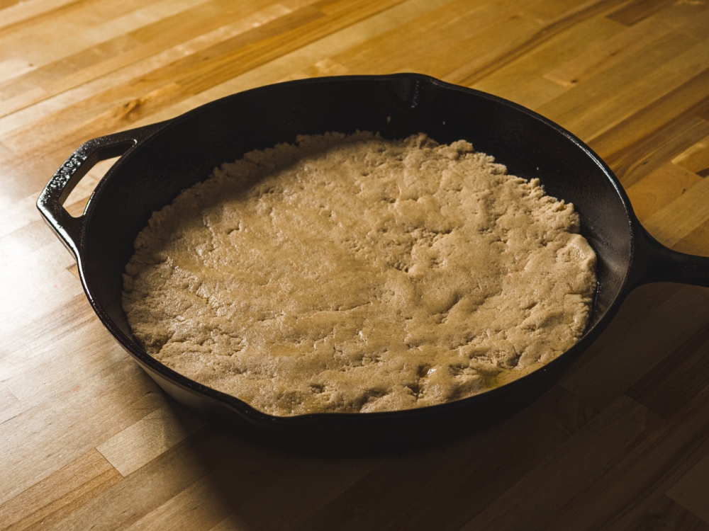making snickerdoodle skillet cake