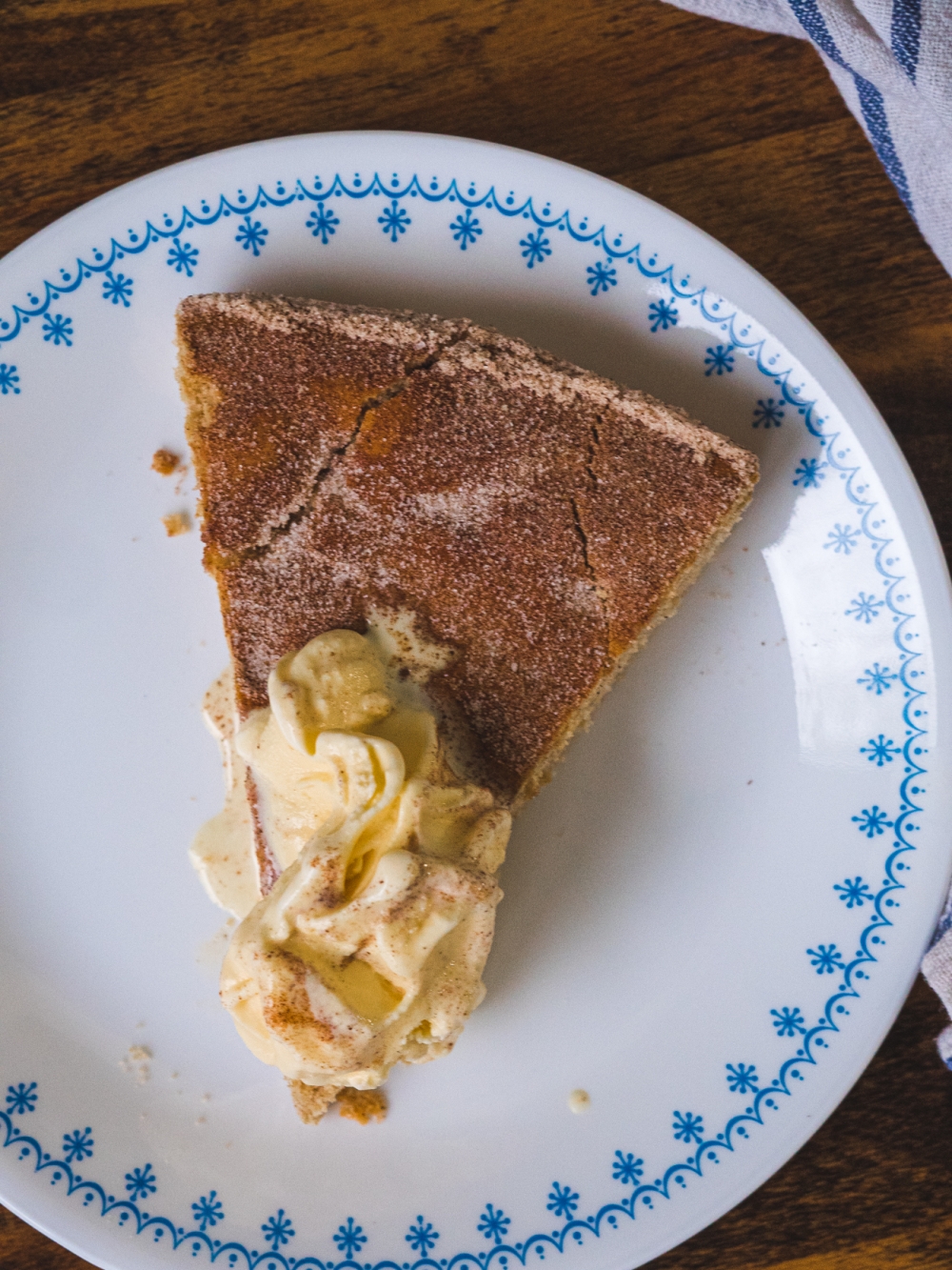 a slice of making snickerdoodle skillet cake with ice cream