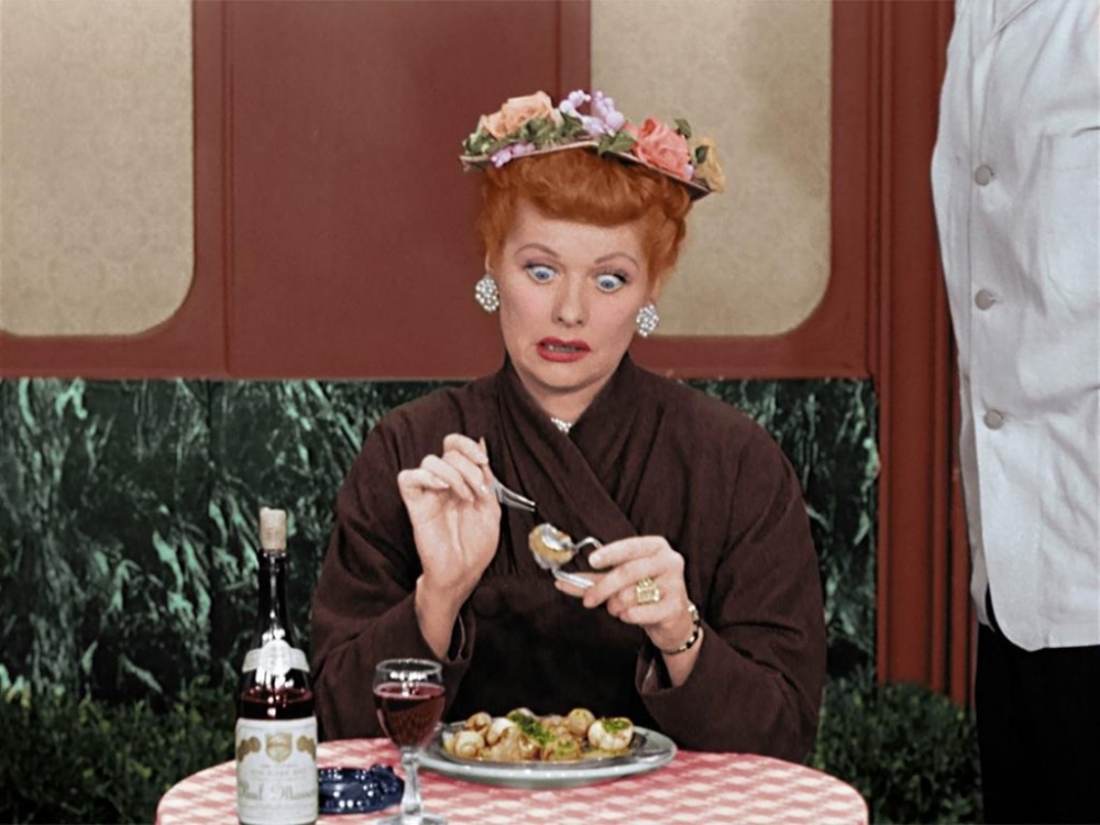 Lucy trying escargot in colorized I Love Lucy Christmas Special