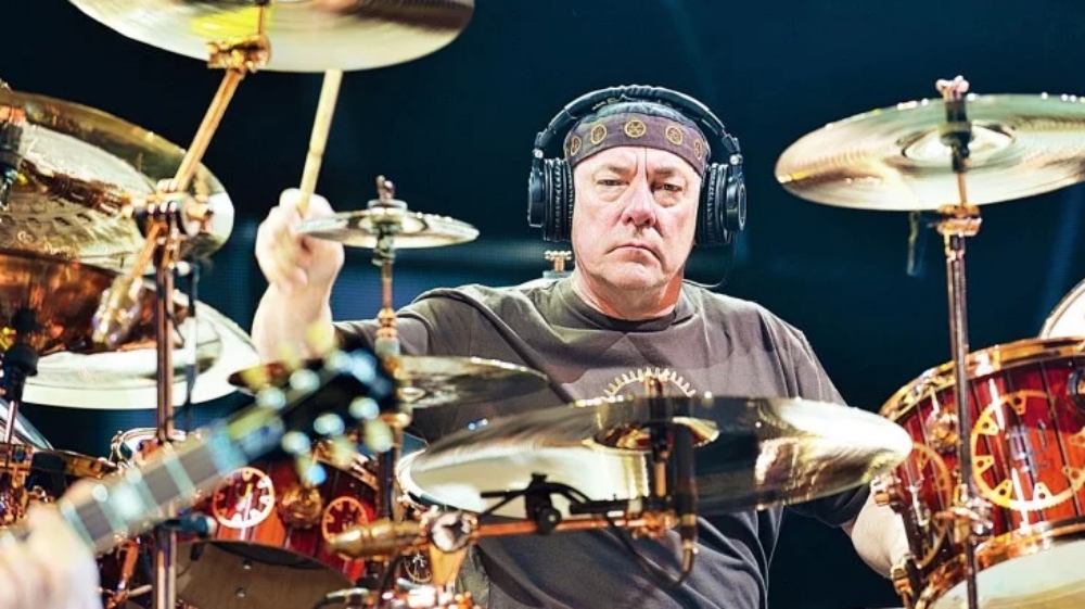 Neil Peart playing drums in the 2000s
