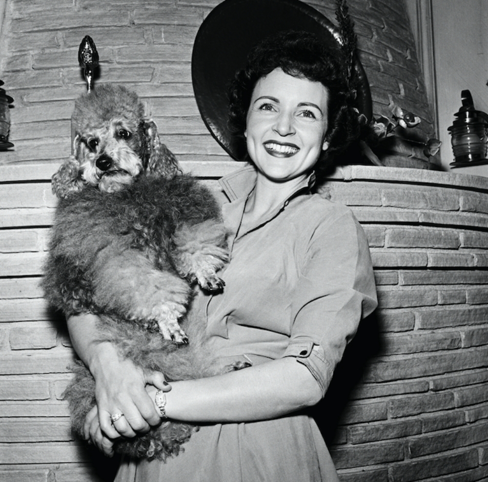 Betty White holding her poodle, Danny