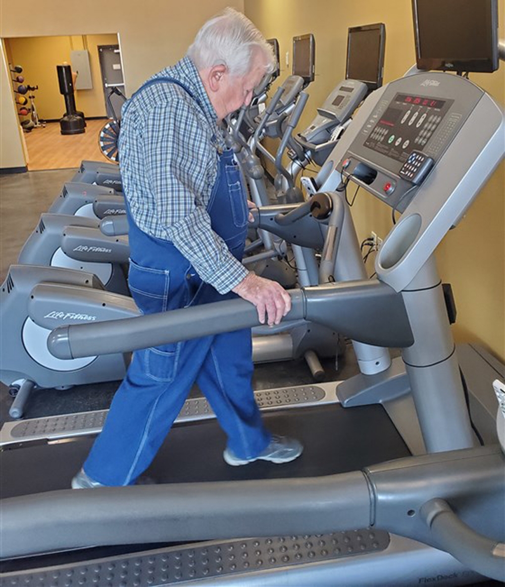 Lloyd Black exercising on the treadmill