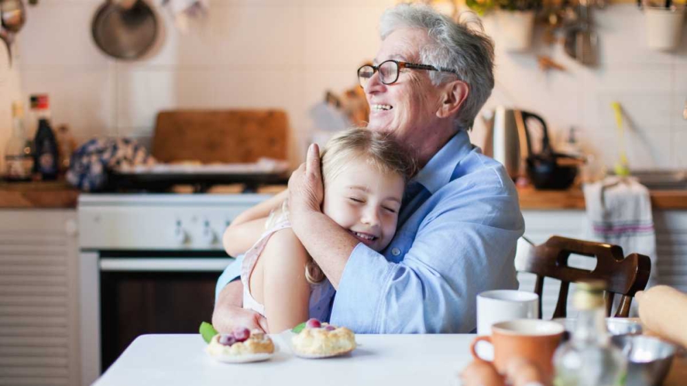 grandparent hugging grandchild