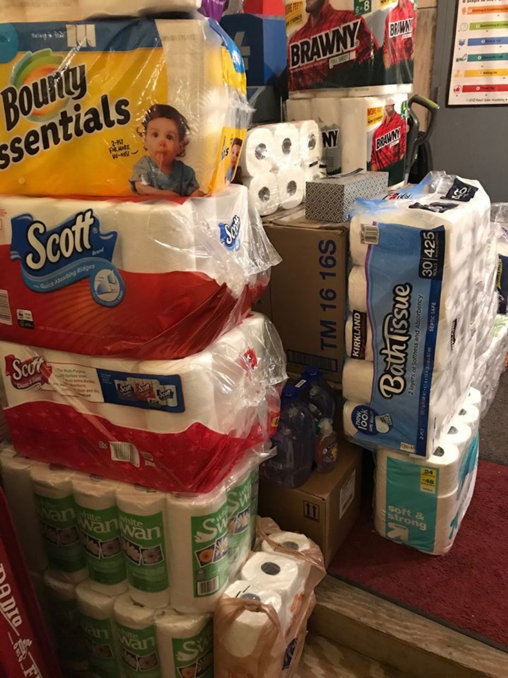 stockpile of paper towels, toilet paper, and kleenex