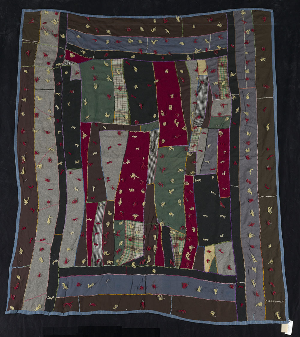 1920s tied crazy quilt rendered in wool.