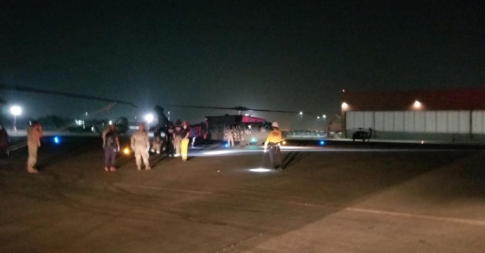 A Chinook and Black Hawk helicopter transported as many as 60 at a time.