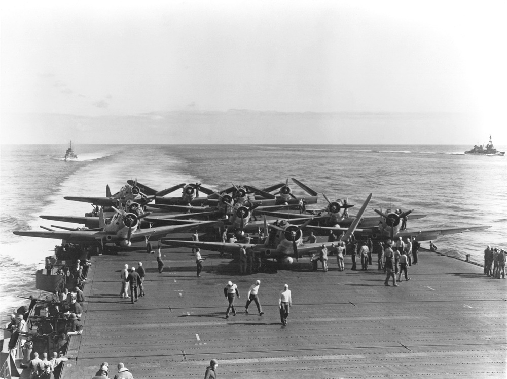 U.S. Navy Torpedo Squadron 6 (VT-6) Douglas TBD-1 Devastator aircraft are prepared for launching aboard the aircraft carrier USS Enterprise.