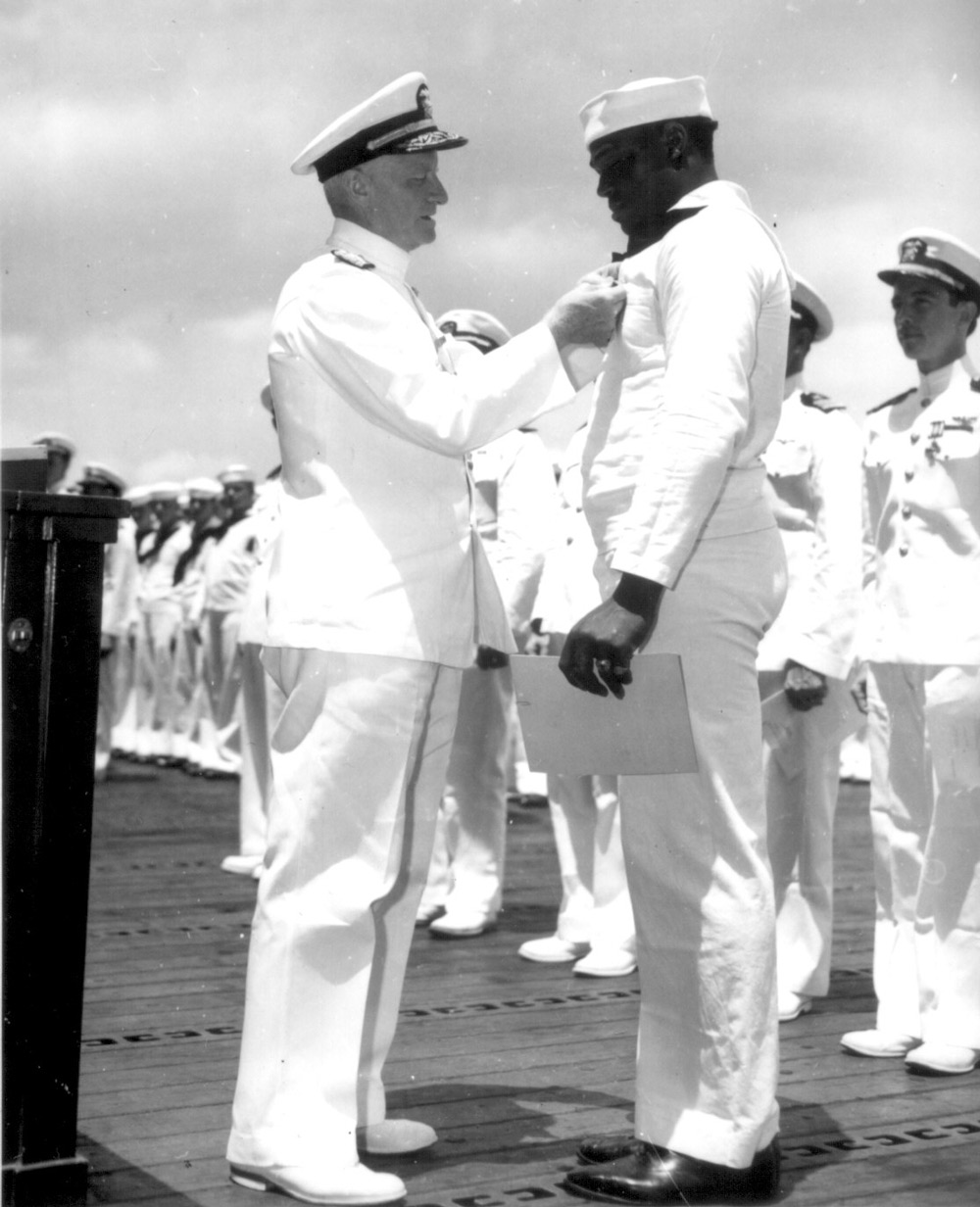Miller was awarded the Navy Cross by Admiral Chester W. Nimitz, Commander-in-Chief of the U.S. Pacific Fleet.