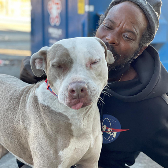 Keith Walker ran into the burning building to save the animals, one being his own Pit Bull Bravo.