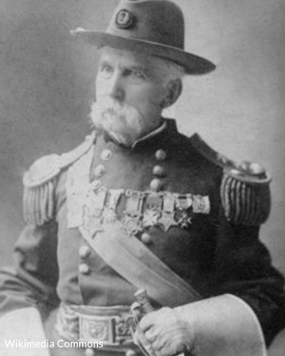 Chamberlain later in life with his Civil War uniform.