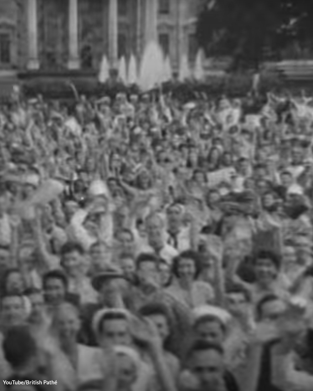 People celebrate in the streets.